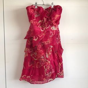 Lightweight sherbet ruffle strapless dress.